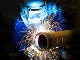 Welder in workshop